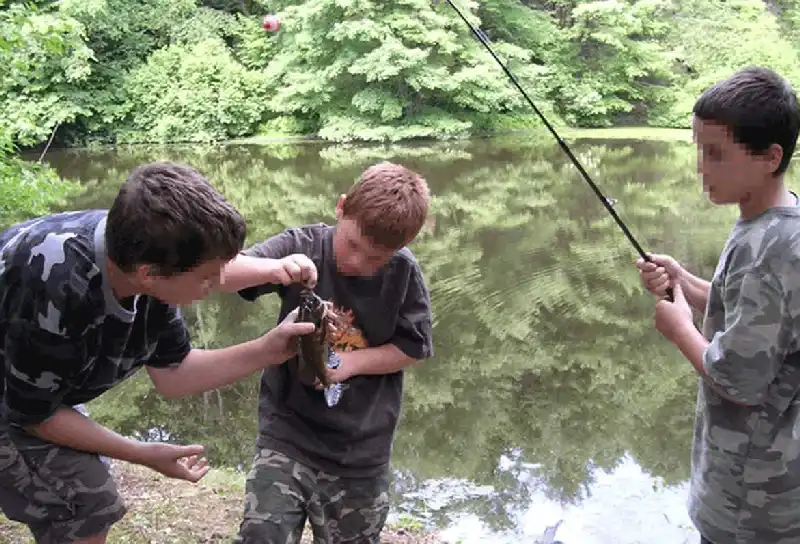 three-boys-with-fish-2026